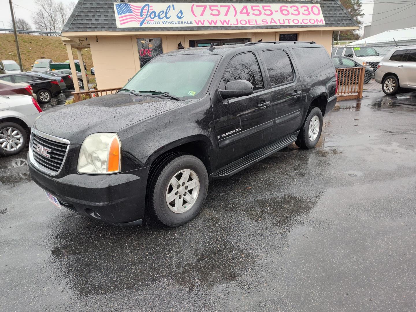 2007 Black GMC Yukon XL (1GKFK16337J) , located at 5700 Curlew Drive, Norfolk, VA, 23502, (757) 455-6330, 36.841885, -76.209412 - Photo#0